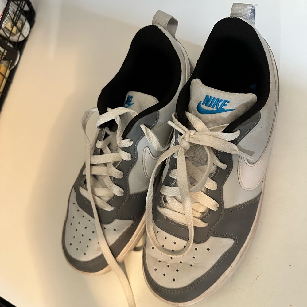 Nike boys Gray and White Sneakers with Blue Accents